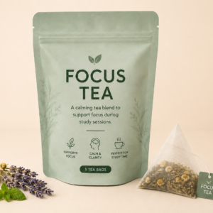 Focus Tea pouch with herbal tea bag on a light beige background